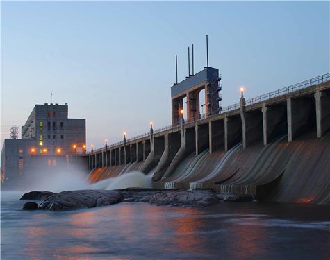 Landscape of a hydroelectric dam at dusk